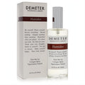 Demeter Humidor 4 oz women's cologne spray. Elegant clear glass bottle, sleek silver cap, and matching white box with brown accents.