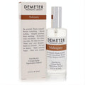Demeter Mahogany 4 oz cologne spray. Sleek clear glass bottle with silver cap and crisp white box, accented by rich brown branding.