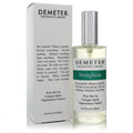 Demeter String Bean 4 oz unisex cologne spray, a clear bottle with silver cap and vibrant green label, beside its elegant white box.