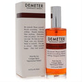 Demeter Tootsie Roll 4 oz cologne spray: clear glass bottle with rich amber liquid, sleek silver cap, and white box.