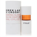Elegant Derek Lam 10 Crosby Looking Glass 1.7 oz EDP spray: modern white bottle, striking amber core, chic cylindrical box.