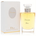 Diorama by Dior Eau De Toilette spray. Elegant clear glass bottle with golden liquid, silver neck, and sophisticated white box with gold accents.