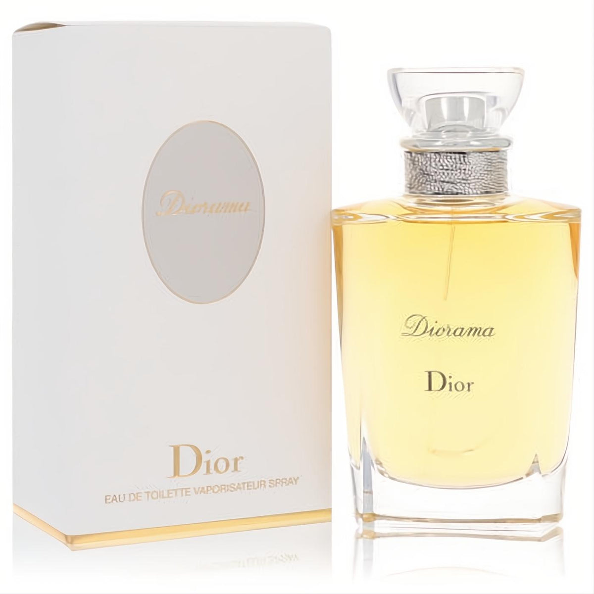 Diorama by Dior Eau De Toilette spray. Elegant clear glass bottle with golden liquid, silver neck, and sophisticated white box with gold accents.