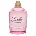 Vibrant pink Dolce Lily by Dolce & Gabbana 2.5 oz EDT tester bottle with elegant script and a luxurious gold cap.