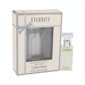 Timeless Calvin Klein Eternity .5 oz Eau de Parfum spray in a clear glass bottle with silver cap, beside its elegant beige box.