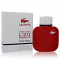Vibrant red Lacoste L.12.12 Pour Elle French Panache 3 oz perfume bottle with white cap and iconic silver crocodile.