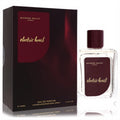 Electric Heart Michael Malul 3.4 oz EDP. Luxurious clear glass bottle with deep red cap & label, beside sleek black box.