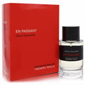En Passant by Frederic Malle 3.4 oz EDP. Clear glass bottle with black & red label, next to its vibrant red box.