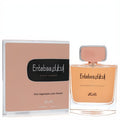 Luxurious Rasasi Entebaa 3.33 oz women's EDP. Amber liquid in a clear glass bottle with a peach-gold cap, presented with its matching elegant box.