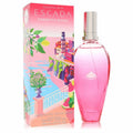 Limited edition Escada Sorbetto Rosso 3.3 oz EDT: vibrant pink bottle, silver cap, and colorful coastal-themed box.