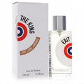 Exit The King 3.4 oz EDP. Sleek clear glass bottle with silver cap, white box featuring bold red/blue logo.