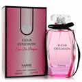Fariis Fleur Explosion 3.4 oz Eau De Parfum. Chic pink faceted bottle with black ribbon, beside its vibrant matching pink box.