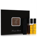 Franck Boclet Fir Balsam men's fragrance travel set. Elegant black box and four 20ml EDP sprays, clear and black bottles.