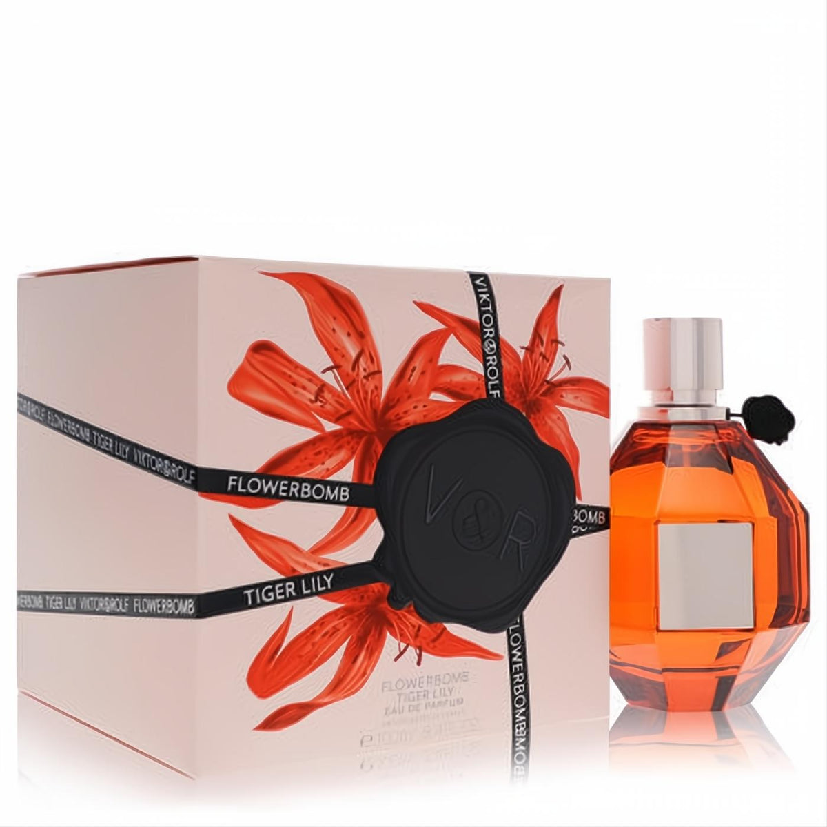 Viktor & Rolf Flowerbomb Tiger Lily 3.4 oz Eau de Parfum. Amber grenade bottle, elegant pink box with vibrant orange lilies and V&R seal.