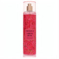 Forever 21 Urban Rose 8 oz body mist. Clear bottle with vibrant pink rose pattern and chic gold sprayer.