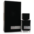 Sophisticated Min New York Forever Now 2.5 oz unisex fragrance. Clear glass bottle with black liquid, square cap, and sleek black box.