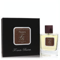 Franck Boclet Flowers 3.3 oz unisex EDP. Luxurious clear bottle with golden liquid, dark cap, and chic black box.