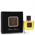 Elegant Franck Boclet Patchouli 3.4 oz men's EDP spray, clear glass bottle with warm amber liquid, and sleek black box.