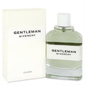 Sophisticated Givenchy Gentleman Cologne: clear glass bottle with fresh green liquid, white cap, and elegant cream box.