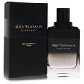 Modern Givenchy Gentleman Boisee 3.3 oz EDP. Sleek black bottle with clear base, visible liquid, and elegant branded box.