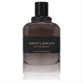 Givenchy Gentleman Boisee 3.3 oz Eau De Parfum. Sleek dark glass bottle with black label and gold lettering.