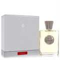 Elegant Giardino Benessere Tuberose 3.4 oz unisex EDP. Clear bottle with golden liquid, fluted silver cap, and sophisticated white box.