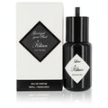 Elegant black Kilian perfume refill bottle with "Love, don't be shy" diamond label, beside its crisp white "Good Girl Gone Bad Extreme" box.
