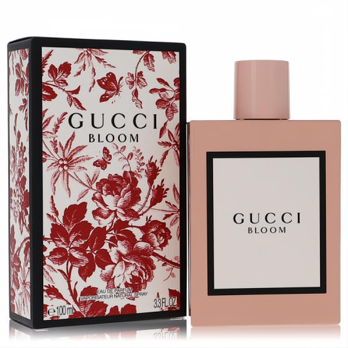 Gucci Bloom 3.3 oz EDP spray. Elegant pale pink bottle and black box with vibrant red floral design.