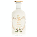 Exquisite Gucci Tears of Iris perfume bottle. Opaque white glass, adorned with a gold owl, 'Tears of Iris' script, and a delicate green bow. Gold cap.