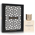 Nishane Hacivat Extrait de Parfum spray: elegant cream bottle with gold cap next to its luxurious black geometric box.