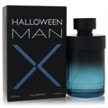 Halloween Man X 4.2 oz EDT. Bold black-to-teal ombre bottle with black cap, beside its sleek black box featuring a striking blue X.