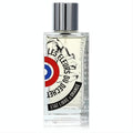 Striking Etat Libre D'orange I Am Trash unisex perfume in a clear glass bottle with a bold red, white, and blue label and sleek silver cap.