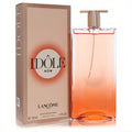 Elevate your scent with Lancome Idole Now 1.7 oz EDP. Features a sleek, vibrant orange gradient glass bottle and elegant peach box.