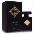 Initio Narcotic Delight 3.04 oz unisex EDP. Luxurious dark bottle with a striking gold emblem and elegant black box.