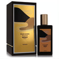 Luxurious Memo Paris Italian Leather 6.8 oz unisex EDP. Sleek black bottle, gold cap, and unique abstract gold, black, orange design with matching box.