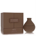 Elevate your scent with Jeff Leatham Rare Fig 1 oz EDP. Features a luxurious matte taupe sculptural bottle and elegant box.