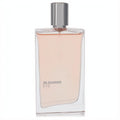 Elegant Jil Sander Eve 1.7 oz women's EDT tester. Clear glass bottle with delicate peach fragrance and sleek silver cap.