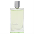 Elegant Jil Sander Evergreen EDT spray. Clear glass bottle with refreshing light green fragrance and sleek silver cap.