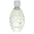 Captivating Jimmy Choo Floral women's perfume in a radiant, textured clear glass bottle with silver trim and a chic square cap.