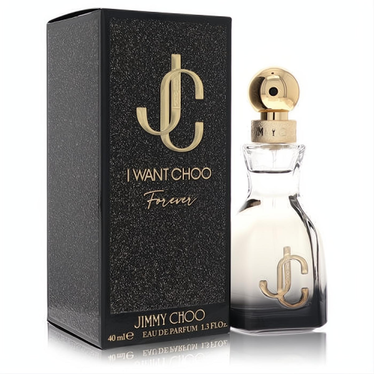 Jimmy Choo I Want Choo Forever 1.3 oz EDP. Elegant clear glass bottle with gold cap and iconic JC logo, beside a luxurious black textured box.