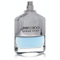 Bold Jimmy Choo Urban Hero men's EDP spray. Sleek silver and clear glass bottle with vibrant blue fragrance.