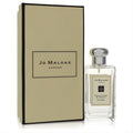 Elevate your scent with Jo Malone English Pear & Freesia cologne. Clear glass bottle, silver cap, and elegant beige box.