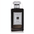 Experience Jo Malone Myrrh & Tonka 3.4 oz unisex cologne in a sleek dark glass bottle with a gleaming silver cap.