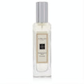 Elegant Jo Malone Pomegranate Noir 1 oz cologne spray. Clear glass bottle, sleek silver cap, and classic cream label.
