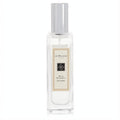 Experience Jo Malone Wild Bluebell 1 oz cologne. Clear glass bottle, elegant silver cap, and signature cream label.