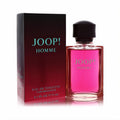Experience Joop! Homme 2.5 oz EDT. Iconic clear glass bottle with vibrant pink fragrance and its sleek dark red box.