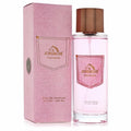 Jordache Frankie 3.4 oz Eau De Parfum: elegant clear bottle with pink fragrance, rose gold cap, and stylish pink denim-textured box.