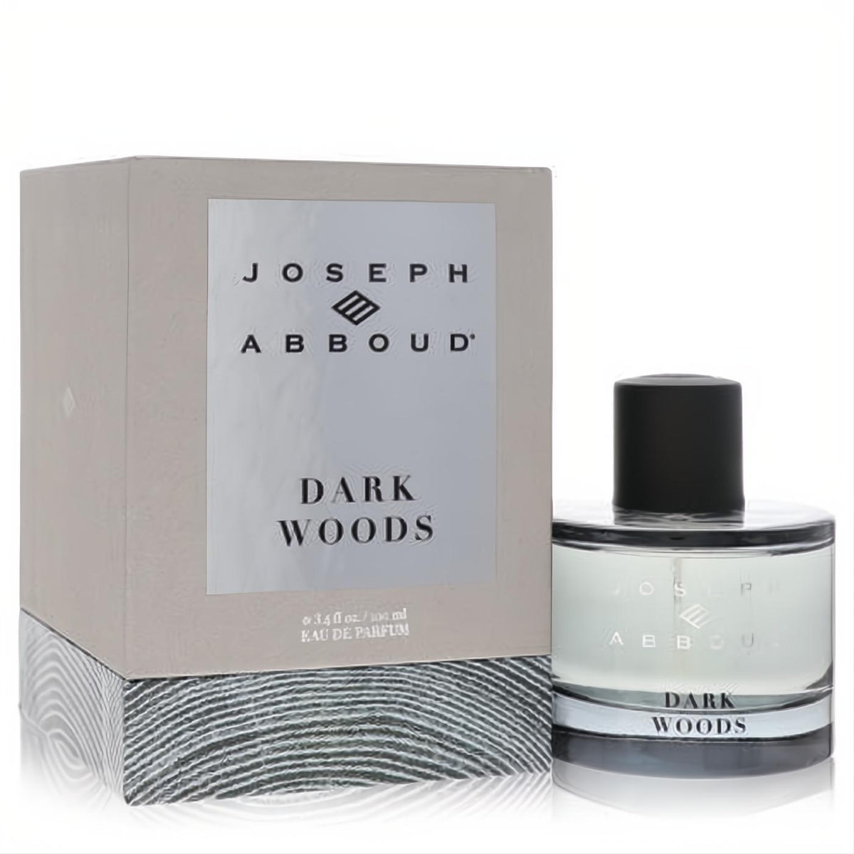 Joseph Abboud Dark Woods 3.4 oz Eau De Parfum for men. Elegant clear glass bottle, black cap, and stylish grey box.