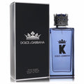 Experience K by Dolce & Gabbana men's Eau de Parfum. Iconic blue bottle with a regal silver crown cap and elegant black box.