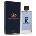 K by Dolce & Gabbana men's EDT. Clear bottle with light blue fragrance, iconic 'K' logo, regal gold crown cap, and matching navy box.